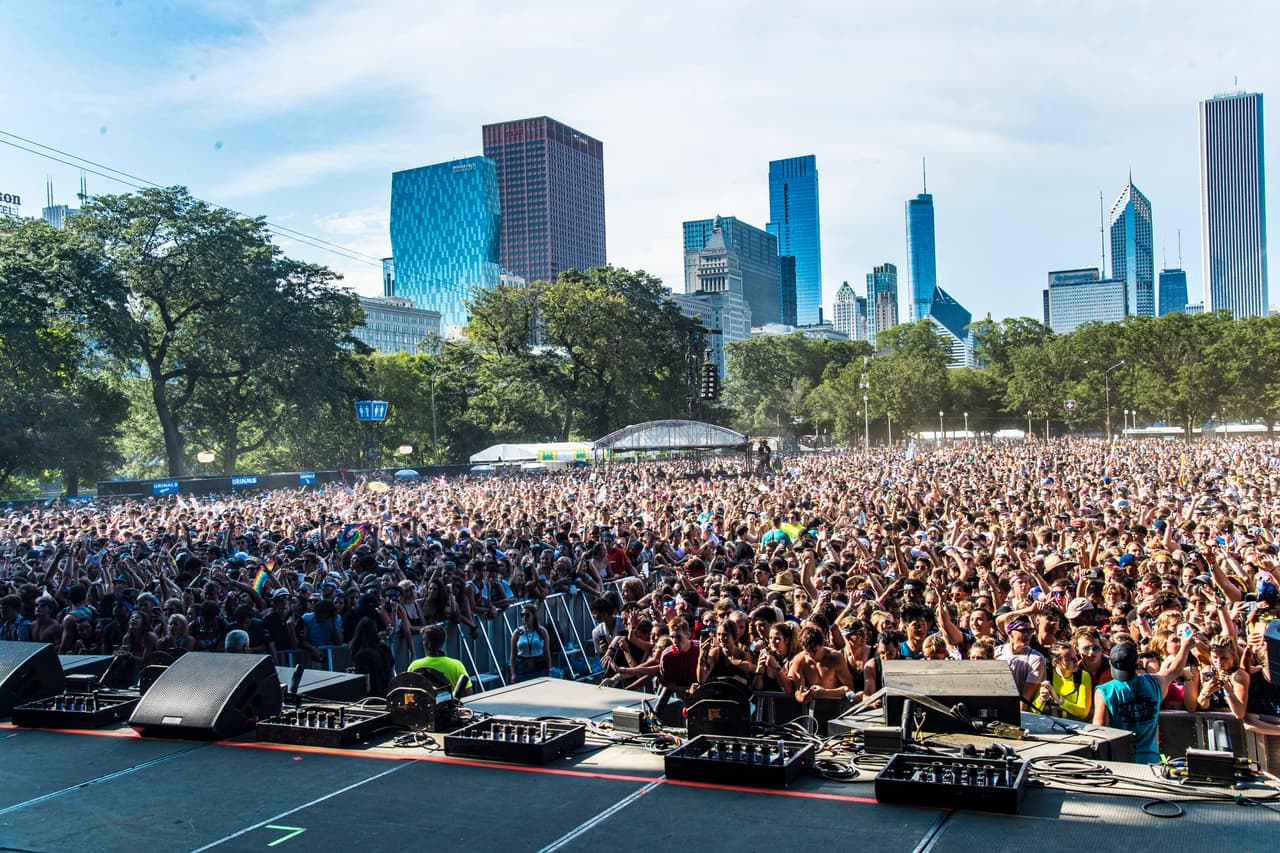 Festival goers attend day three of Lollapalooza in Grant Park on Saturday, Aug. 3, 2019, in Chicago. (Photo by Amy Harris/Invision/AP)