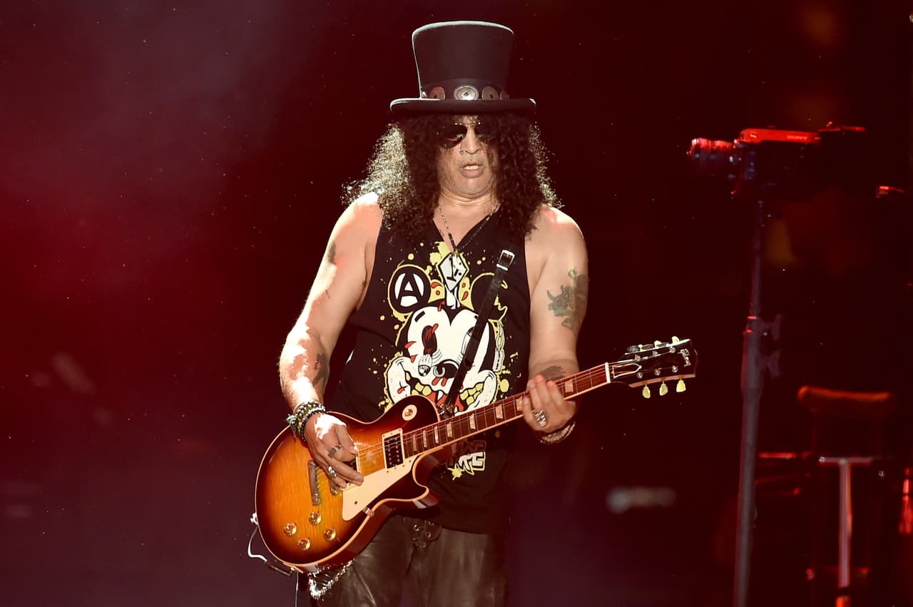 INDIO, CA - APRIL 16: Musician Slash of Guns N' Roses performs onstage during day 2 of the 2016 Coachella Valley Music & Arts Festival Weekend 1 at the Empire Polo Club on April 16, 2016 in Indio, California. (Photo by Kevin Winter/Getty Images for Coachella)